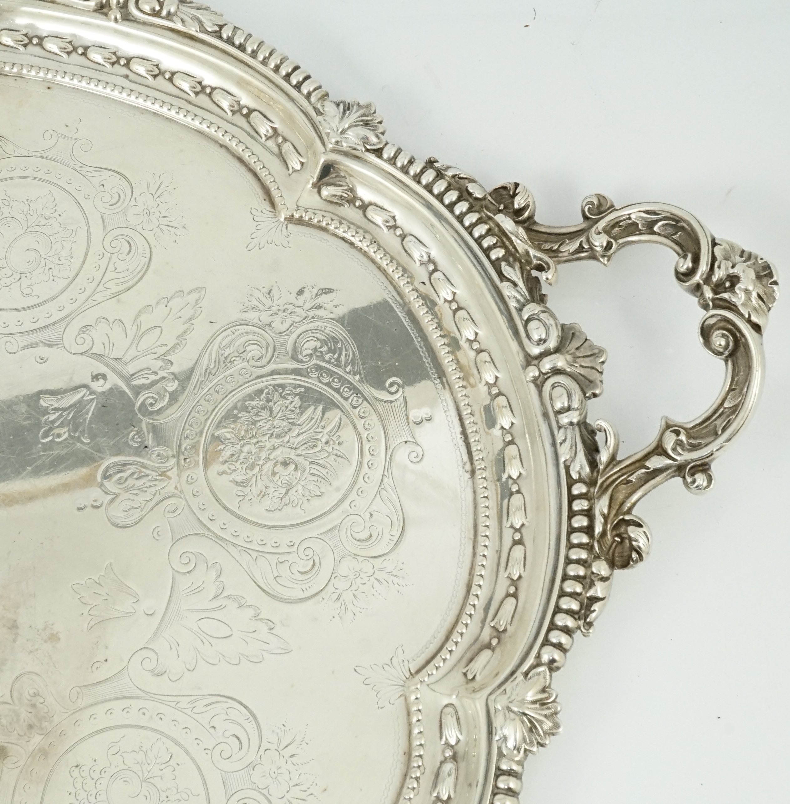 A large Victorian silver oval two handled tea tray, by Hawksworth, Eyre & Co
